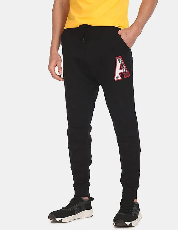 Aeropostale Men Black Mid Rise Solid Joggers