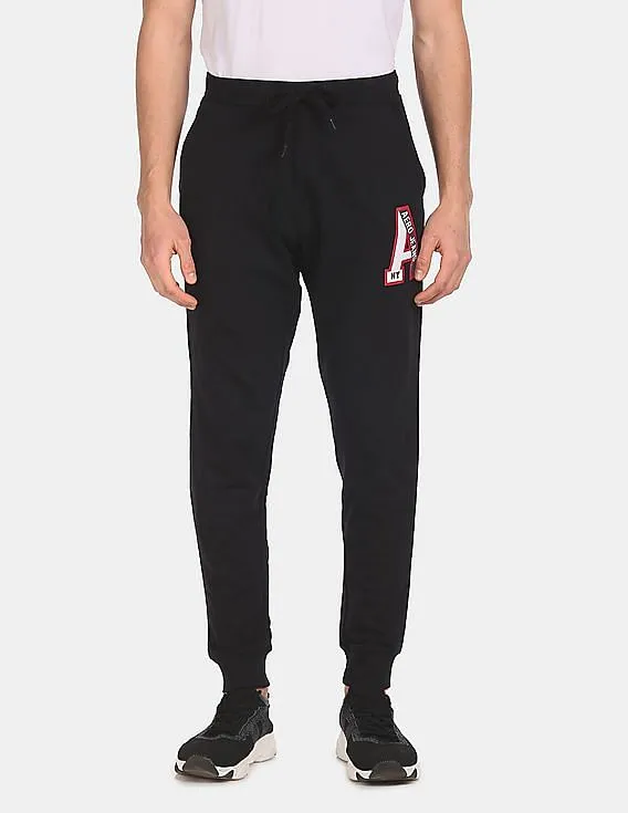 Aeropostale Men Black Mid Rise Solid Joggers