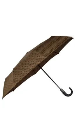 Camel monogram-pattern umbrella with logo strap